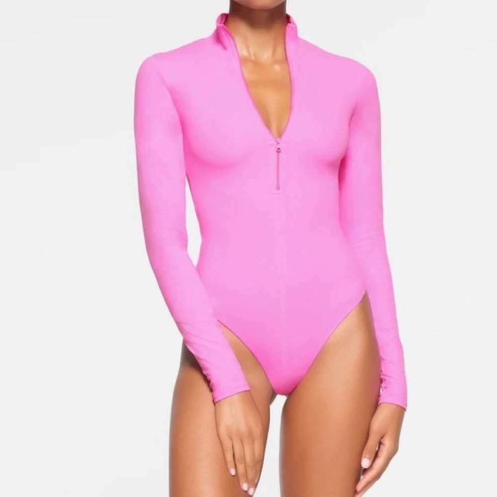 SKIMS Pink Fitted Polo Bodysuit